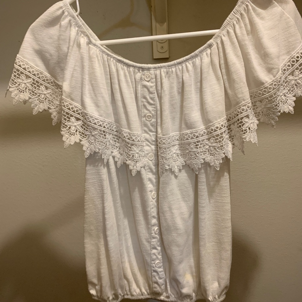 White blouse off the shoulder